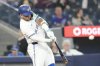 Blue Jays shortstop Bo Bichette (11) hits a two-run home run off Philadelphia Phillies pitcher Jesus Luzardo (44) in the second inning of a Major League Baseball game in Toronto on Thursday, June 5, 2025. THE CANADIAN PRESS/Chris Young