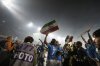 Players celebrate at the end of the Italian Serie A soccer match between Napoli and Cagliari at the Diego Maradona stadium in Naples, Italy, Friday, May 23, 2025. (AP Photo/Gregorio Borgia)