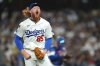 Los Angeles Dodgers starting pitcher Dustin May celebrates after the top of the eighth inning of a baseball game against the Arizona Diamondbacks, Wednesday, May 21, 2025, in Los Angeles. (AP Photo/Mark J. Terrill)