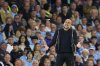 Manchester City's head coach Pep Guardiola reacts during the English Premier League soccer match between Manchester City and Bournemouth at the Etihad stadium in Manchester, England, Tuesday, May 20, 2025. (AP Photo/Dave Thompson)