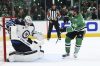 GARETH PATTERSON / ASSOCIATED PRESS
Winnipeg Jets goaltender Connor Hellebuyck blocks a shot with his shoulder pad from Dallas Stars' Sam Steel (18) in the third period of Game 6 of a second-round NHL hockey playoff series in Dallas, Saturday, May 17, 2025.