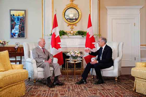 Prime Minister Mark Carney (right) has an audience with King Charles at Rideau Hall in Ottawa during a royal visit on Monday. (Sean Kilpatrick / The Canadian Press)