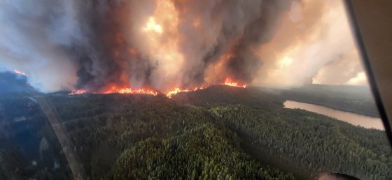 An aerial photo of a wildfire threatening Flin Flon taken on Tuesday. (Government of Manitoba)