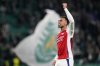FILE - Arsenal's Gabriel gestures to the supporters at the end of the Champions League opening phase soccer match between Sporting CP and Arsenal at the Alvalade stadium in Lisbon, Tuesday, Nov. 26, 2024. (AP Photo/Armando Franca, file)