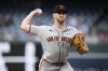 San Francisco Giants starting pitcher Landen Roupp throws during the first inning of a baseball game against the Washington Nationals, Friday, May 23, 2025, in Washington. (AP Photo/Nick Wass)