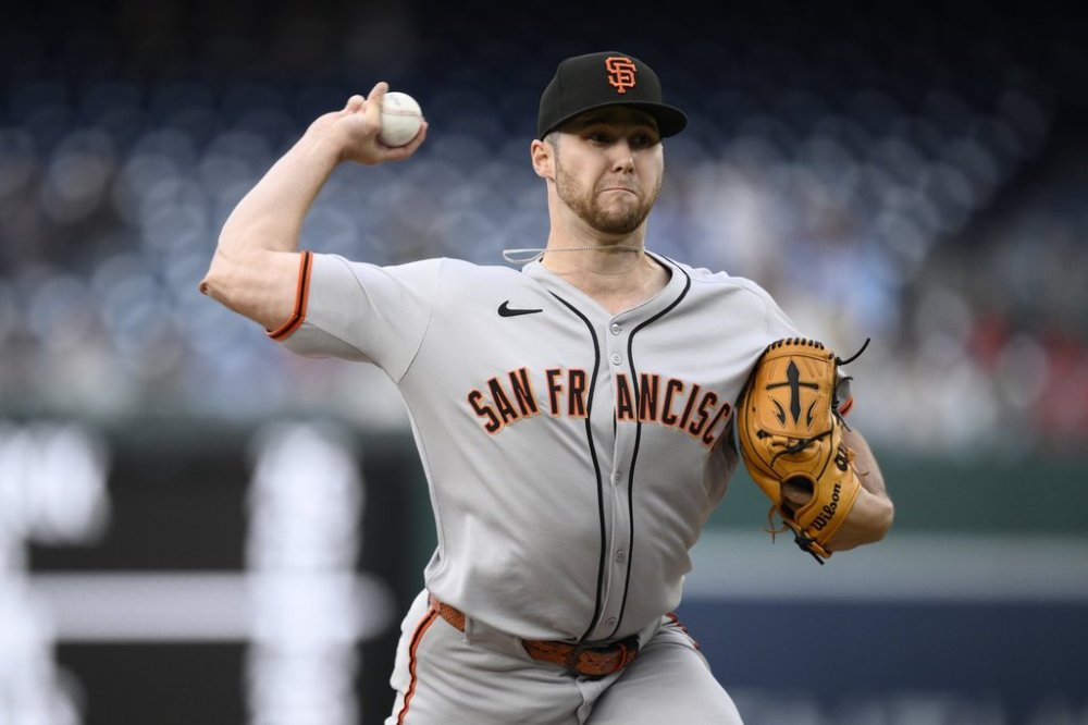 San Francisco Giants starting pitcher Landen Roupp throws during the first inning of a baseball game against the Washington Nationals, Friday, May 23, 2025, in Washington. (AP Photo/Nick Wass)