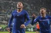 Chelsea's Jadon Sancho, left, celebrates after scoring his side's third goal during the Europa Conference League final soccer match between Real Betis and Chelsea in Wroclaw, Poland, Wednesday, May 28, 2025. (AP Photo/Czarek Sokolowski)