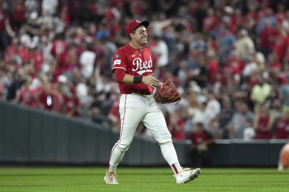 Cincinnati Reds' TJ Friedl celebrates at the conclusion of a baseball game against the Milwaukee Brewers, Tuesday, June 3, 2025, in Cincinnati. (AP Photo/Kareem Elgazzar)
