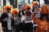 Fans of San Francisco Giants' Jung Hoo Lee, who call themselves Hoo Lee Gans, greet fellow fans as they arrive before a baseball game between the Giants and the Arizona Diamondbacks in San Francisco, Tuesday, May 13, 2025. (AP Photo/Jeff Chiu)