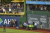A fan is carted off the field at PNC Park after falling out of the stands during the seventh inning of a baseball game between the Pittsburgh Pirates and the Chicago Cubs in Pittsburgh, Wednesday, April 30, 2025. (AP Photo/Gene J. Puskar)