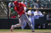 Los Angeles Angels' Taylor Ward hits a grand slam during the seventh inning of a baseball game against the Athletics in West Sacramento, Calif., Thursday, May 22, 2025. (AP Photo/Nic Coury)