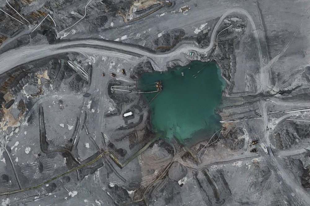 FILE - An aerial view of a sump at the Cobre Panama copper open-pit mine during a press tour of the mine, owned by Canada's First Quantum Minerals, in Donoso, Panama, March 21, 2025. (AP Photo/Matias Delacroix, File)