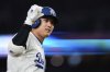 Los Angeles Dodgers' Shohei Ohtani celebrates after hitting a three-run home run during the third inning of a baseball game against the Athletics, Thursday, May 15, 2025, in Los Angeles. (AP Photo/Mark J. Terrill)