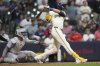 Milwaukee Brewers' Christian Yelich hits a walk off grand slam during the 10th inning of a baseball game against the Boston Red Sox, Tuesday, May 27, 2025, in Milwaukee. (AP Photo/Aaron Gash)