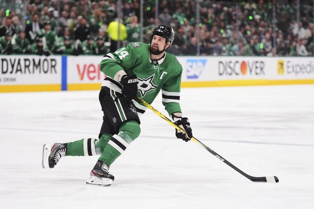 Dallas Stars' Jamie Benn (14) skates to the puck in the first period in Game 7 of a first-round NHL hockey playoff series againts the Colorado Avalanche Saturday, May 3, 2025, in Dallas. (AP Photo/Julio Cortez)