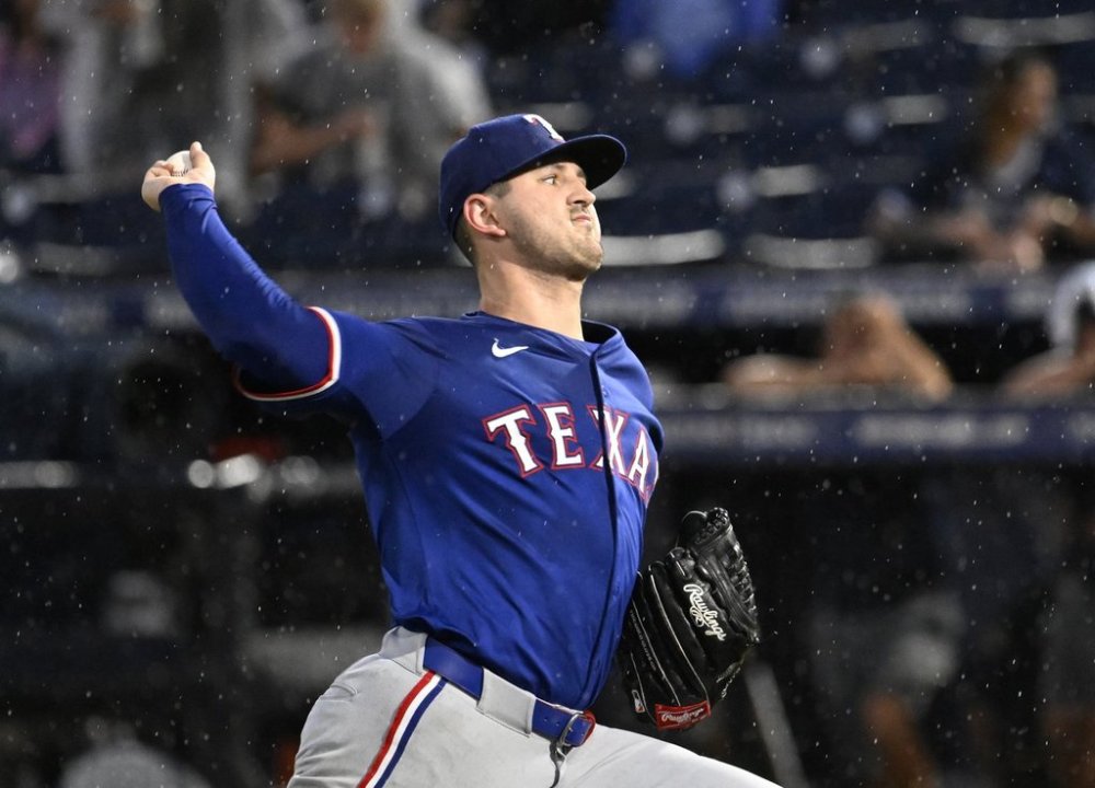 Texas Rangers pitcher Tyler Mahle throws during the second inning of a baseball game against the Tampa Bay Rays, Tuesday, June 3, 2025, in Tampa, Fla. (AP Photo/Jason Behnken)