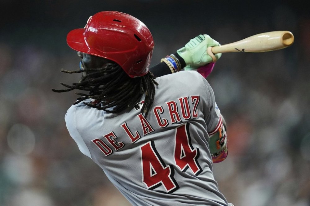 Cincinnati Reds' Elly De La Cruz hits a home run during the first inning of a baseball game against the Houston Astros in Houston, Saturday, May 10, 2025. TJ Friedl and Matt McLain also scored. (AP Photo/Ashley Landis)