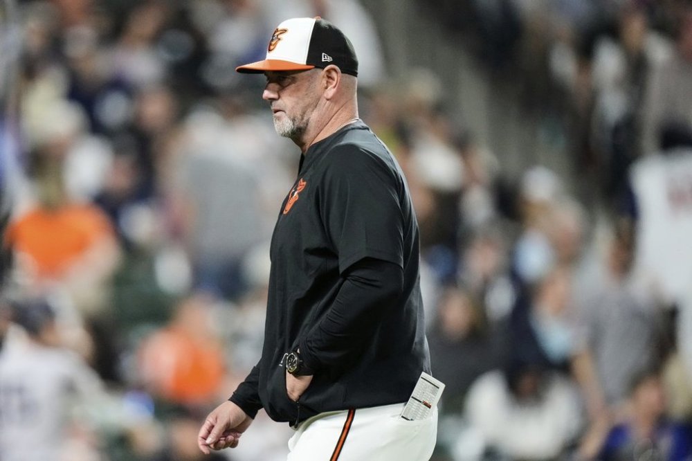 Baltimore Orioles manager Brandon Hyde returns to the dugout after making a pitching change during the seventh inning of a baseball game against the New York Yankees, Monday, April 28, 2025, in Baltimore. (AP Photo/Stephanie Scarbrough)