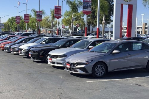 This photo provided by Edmunds shows a lineup of used vehicles at a Nissan dealership in Fresno, California. Buying a used vehicle this Memorial Day weekend is one of the ways you can avoid the uncertainty of new vehicle pricing. (Brent Romans/Courtesy of Edmunds via AP)
