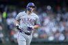 Texas Rangers' Corey Seager circles the bases after hitting a home run against the Detroit Tigers during the seventh inning of a baseball game Saturday, May 10, 2025, in Detroit. (AP Photo/Lon Horwedel)