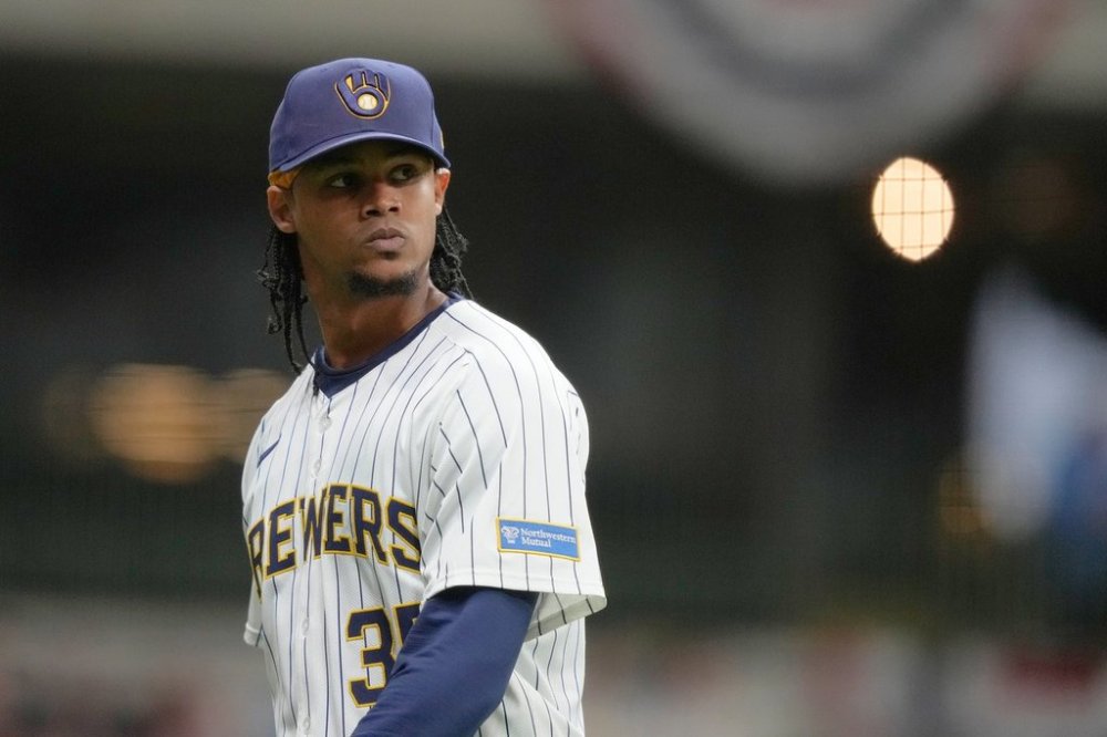 FILE - Milwaukee Brewers' Elvin Rodriguez looks back during the fourth inning of a baseball game against the Cincinnati Reds, Saturday, April 5, 2025, in Milwaukee. (AP Photo/Aaron Gash, FIle)