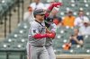 Minnesota Twins' Christian Vazquez, left, celebrates with Willi Castro after hitting a three-run home run during the fourth inning in the first baseball game of a doubleheader against the Baltimore Orioles, Wednesday, May 14, 2025, in Baltimore. (AP Photo/Stephanie Scarbrough)