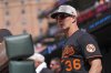 Baltimore Orioles interim manager Tony Mansolino looks on from the dugout during the eighth inning of a baseball game against the Washington Nationals Sunday, May 18, 2025, in Baltimore. (AP Photo/Julio Cortez)