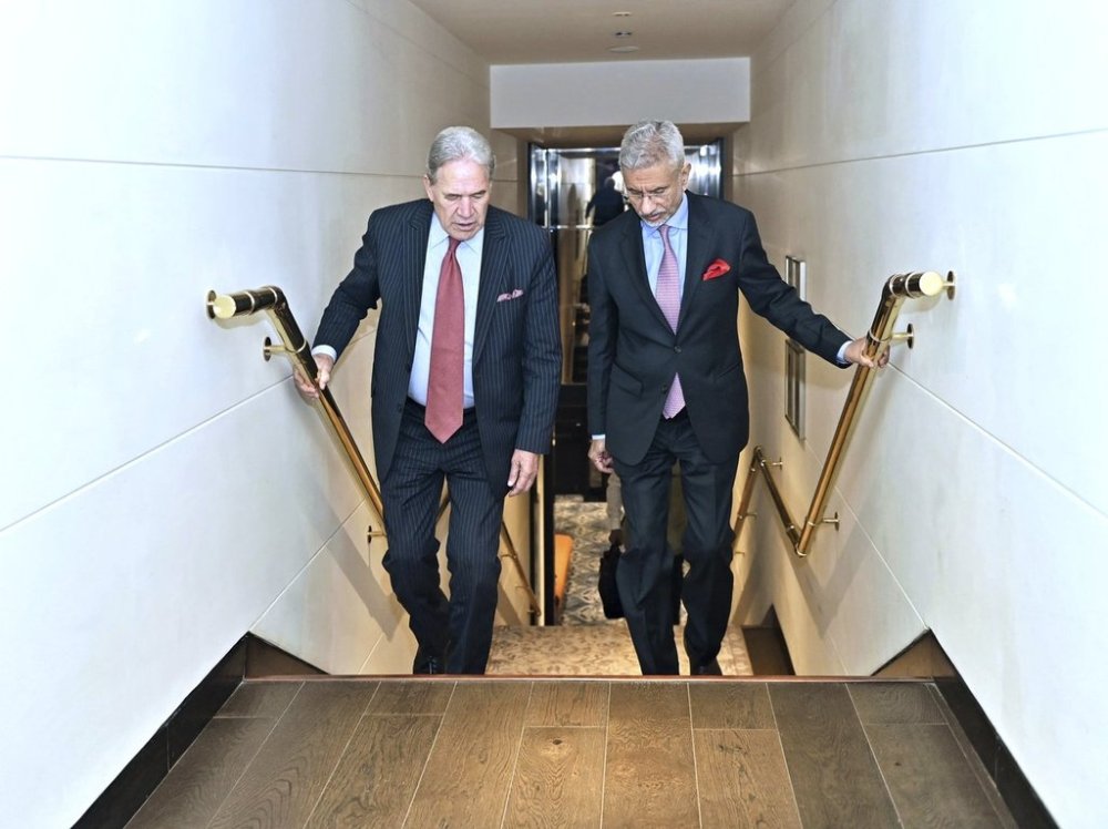 Indian Foreign Minister S. Jaishankar, right, climbs a staircase with New Zealand's Deputy Prime Minister and Foreign Minister Winston Peters in New Delhi, India, Thursday, May 29, 2025. (Indian Foreign Minister S. Jaishankar on X, via AP)
