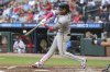 Arizona Diamondbacks' Ketel Marte hits a two-run home run in the third inning of a baseball game against the Atlanta Braves, Tuesday, June 3, 2025, in Atlanta. (AP Photo/Colin Hubbard)
