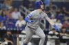 Chicago Cubs' Kyle Tucker watches after hitting a solo home run during the first inning of a baseball game against the Miami Marlins Tuesday, May 20, 2025, in Miami. (AP Photo/Lynne Sladky)