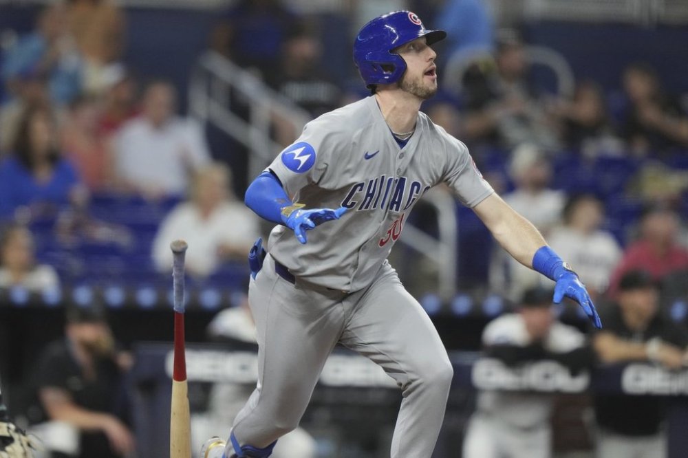 Chicago Cubs' Kyle Tucker watches after hitting a solo home run during the first inning of a baseball game against the Miami Marlins Tuesday, May 20, 2025, in Miami. (AP Photo/Lynne Sladky)