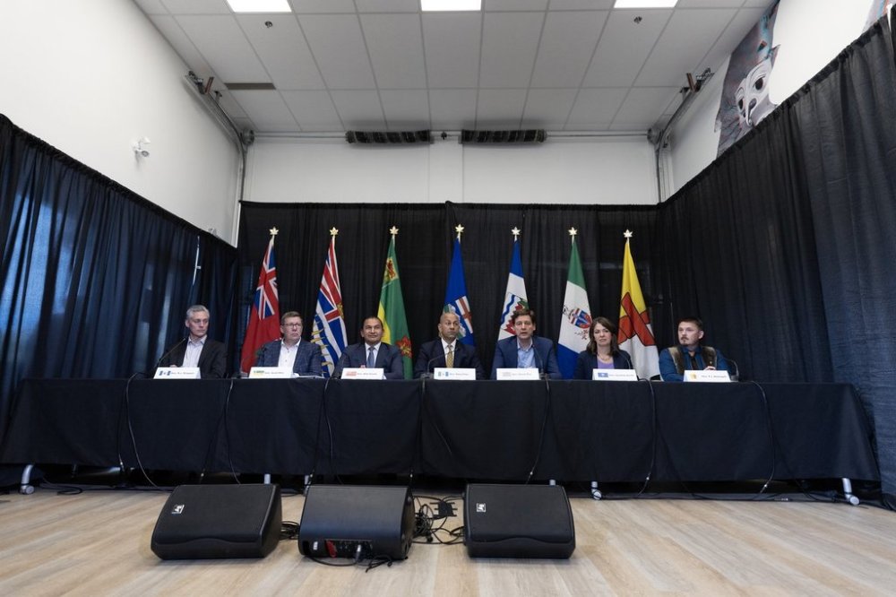 Northwest Territories Premier R.J Simpson, from left, Saskatchewan Premier Scott Moe, Manitoba Premier Wab Kinew, Yukon Premier Ranj Pillai, British Columbia Premier David Eby, Alberta Premier Danielle Smith and Nunavut Premier P.J. Akeeagok during a media availability at the 2024 Western Premiers' Conference in Whitehorse, Monday, June 10, 2024. CANADIAN PRESS/Crystal Schick