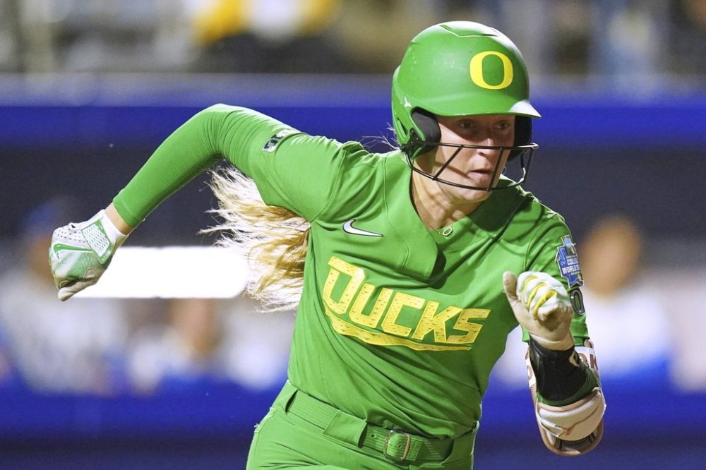 FILE - Oregon catcher Emma Cox (21) during an NCAA softball Women's College World Series game in Oklahoma City, Thursday, May 29, 2025. (AP Photo/Vera Nieuwenhuis, File)