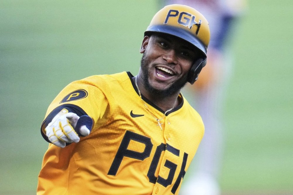 Pittsburgh Pirates' Alexander Canario celebrates as he rounds third after hitting a solo home run off Atlanta Braves pitcher Bryce Elder during the third inning of a baseball game in Pittsburgh, Friday, May 9, 2025. (AP Photo/Gene J. Puskar)