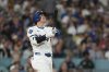 Los Angeles Dodgers' Shohei Ohtani hits a solo home run during the sixth inning of a baseball game against the New York Yankees, Friday, May 30, 2025, in Los Angeles. (AP Photo/Mark J. Terrill)