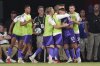 Orlando City forward Marco Pasalic (87) celebrates with teammates after scoring his side's second goal against Inter Miami during the second half of an MLS soccer match, Sunday, May 18, 2025, in Fort Lauderdale, Fla. (AP Photo/Rebecca Blackwell)
