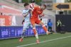 Rezart Rama (24) of Hamilton Forge FC jumps for a ball with Tom Pearce (3) of CF Montreal during first half Canadian Championship quarterfinal soccer action in Hamilton on Tuesday, May 20, 2025. THE CANADIAN PRESS/Nick Iwanyshyn