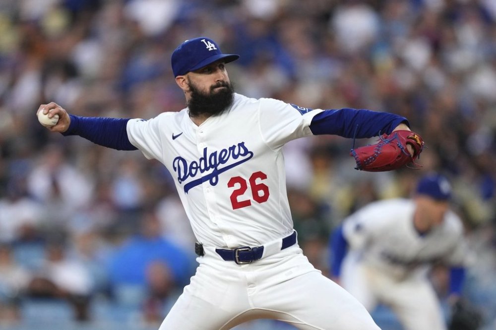 Los Angeles Dodgers starting pitcher Tony Gonsolin throws to the plate during the second inning of a baseball game against the New York Mets, Wednesday, June 4, 2025, in Los Angeles. (AP Photo/Mark J. Terrill)