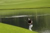 Xander Schauffele chips to the green on the 16th hole during the first round of the PGA Championship golf tournament at the Quail Hollow Club, Thursday, May 15, 2025, in Charlotte, N.C. (AP Photo/David J. Phillip)