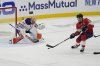 Edmonton Oilers goaltender Stuart Skinner (74) defends the net as Florida Panthers centre Sam Reinhart (13) makes a shot during the third period of Game 7 of the NHL hockey Stanley Cup Final, Monday, June 24, 2024, in Sunrise, Fla. The Panthers defeated the Oilers 2-1 to win the Stanley Cup. (AP Photo/Rebecca Blackwell)