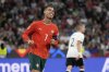 Portugal's Cristiano Ronaldo reacts after missing an opportunity to score during the Nations League semifinal soccer match between Portugal and Germany at the Munich Football Arena, in Munich, Germany, Wednesday, June 4, 2025. (AP Photo/Matthias Schrader)