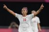 Canada's Desiree Scott celebrates at the end of a women's soccer match against Chile at the 2020 Summer Olympics, Saturday, July 24, 2021, in Sapporo, Japan. Canada won 2-1. (AP Photo/Silvia Izquierdo)