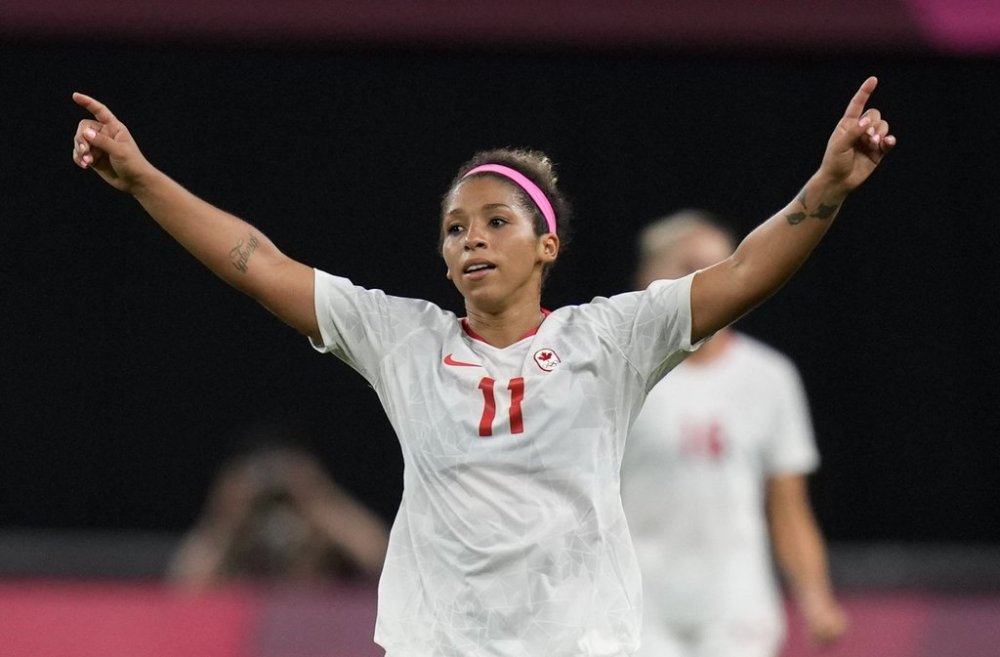 Canada's Desiree Scott celebrates at the end of a women's soccer match against Chile at the 2020 Summer Olympics, Saturday, July 24, 2021, in Sapporo, Japan. Canada won 2-1. (AP Photo/Silvia Izquierdo)