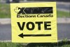 An Elections Canada sign points the way to a polling station on federal election day in Chambly, Que., Monday, April 28, 2025. THE CANADIAN PRESS/Graham Hughes