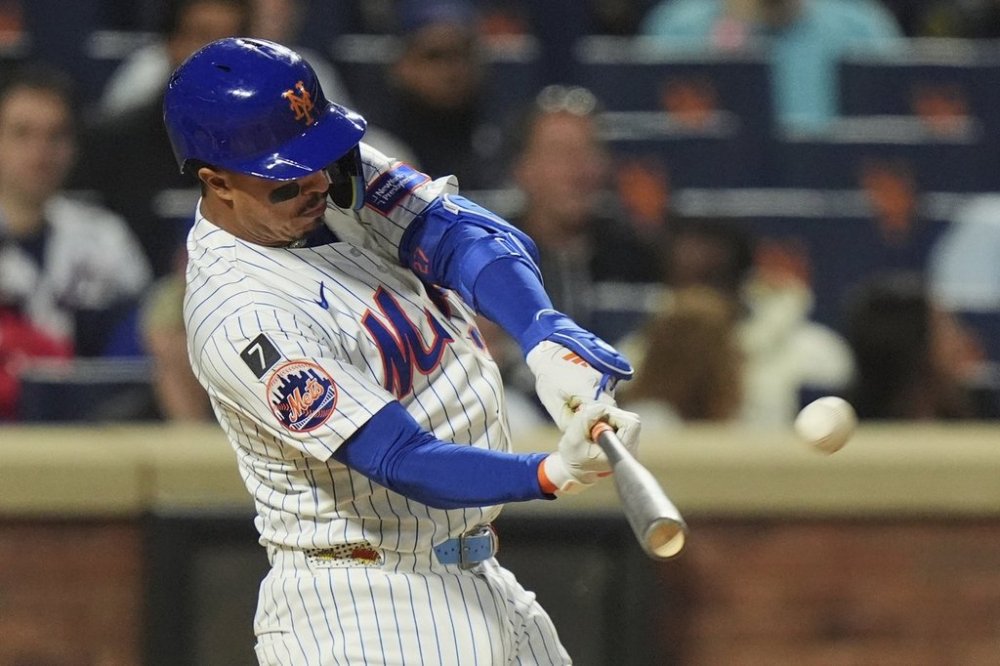 New York Mets' Mark Vientos hits a home run during the third inning of a baseball game against the Arizona Diamondbacks Wednesday, April 30, 2025, in New York. (AP Photo/Frank Franklin II)