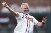 FILE - Atlanta Braves' Chipper Jones throws the ceremonial first pitch, April 22, 2025, in Atlanta. (AP Photo/Colin Hubbard, File)
