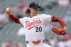 Minnesota Twins starting pitcher Chris Paddack (20) delivers during the second inning of a baseball game against the Toronto Blue Jays, Saturday, June 7, 2025, in Minneapolis. (AP Photo/Abbie Parr)