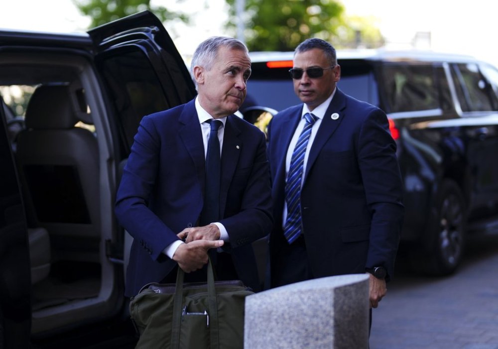 Prime Minister Mark Carney arrives to Parliament Hill in Ottawa on Wednesday, May 28, 2025. THE CANADIAN PRESS/Sean Kilpatrick