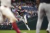 Atlanta Braves shortstop Luke Williams throws to first base after fielding a single by Philadelphia Phillies' Kyle Schwarber during the eighth inning in the second baseball game of a doubleheader Thursday, May 29, 2025, in Philadelphia. (AP Photo/Matt Slocum)