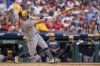Milwaukee Brewers' Rhys Hoskins hits a three-run home run during the fourth inning of a baseball game against the Philadelphia Phillies, Saturday, May 31, 2025, in Philadelphia. (AP Photo/Chris Szagola)